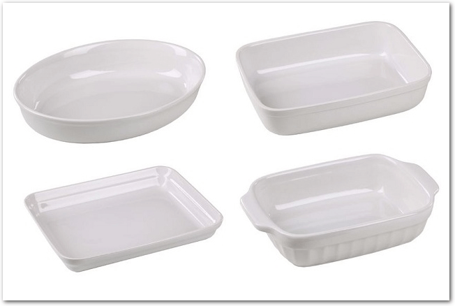 Four different white enamel dishes in a row